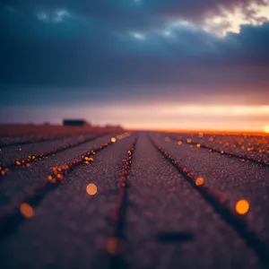 Sunset Drive on Rural Highway: Serene Skyline