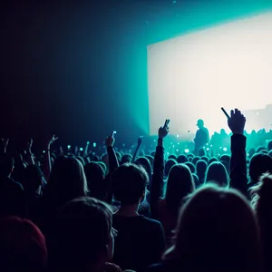 Nighttime Concert Crowd Cheering with Vibrant Lights