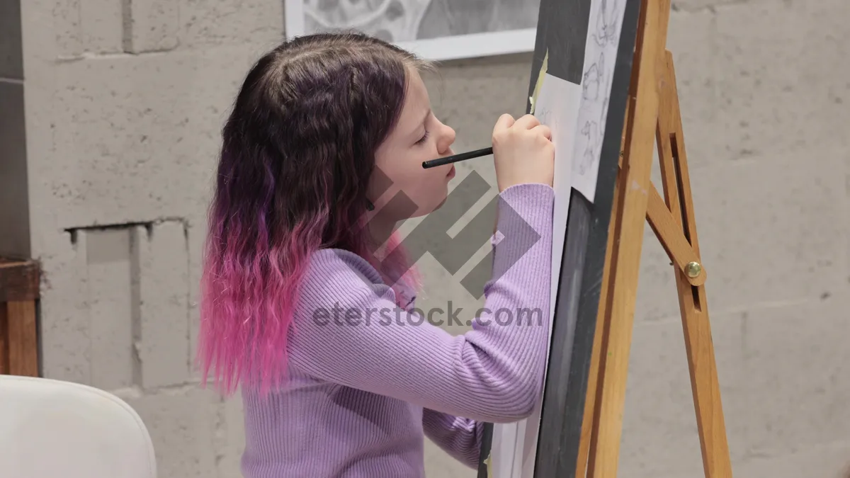 Picture of Happy adult painter at work in office