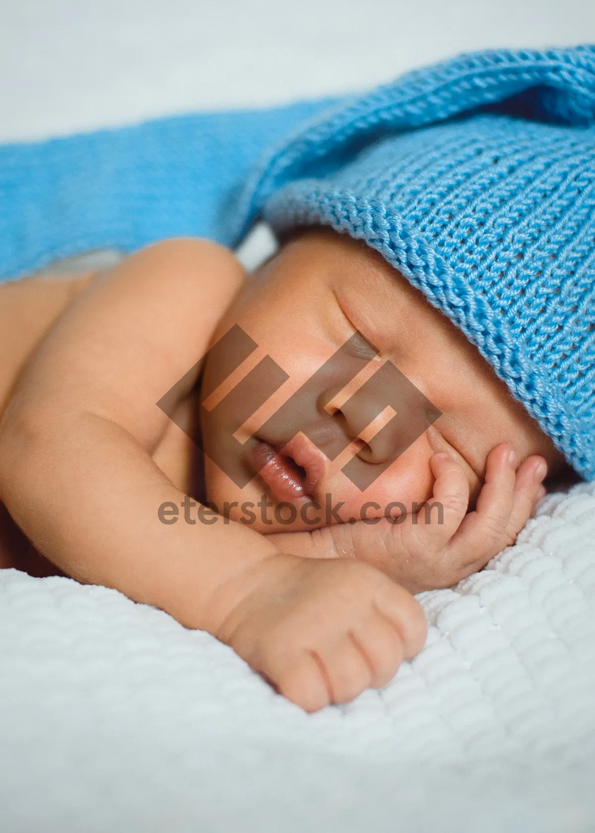 Picture of Sweet Toddler Sleeping Peacefully in Soft Towel