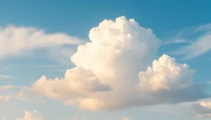 Sunshine-filled Sky Over Summer Landscape with Fluffy Clouds