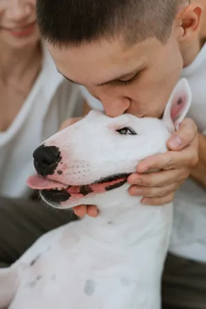 Adorable baby boy portrait with cute dog