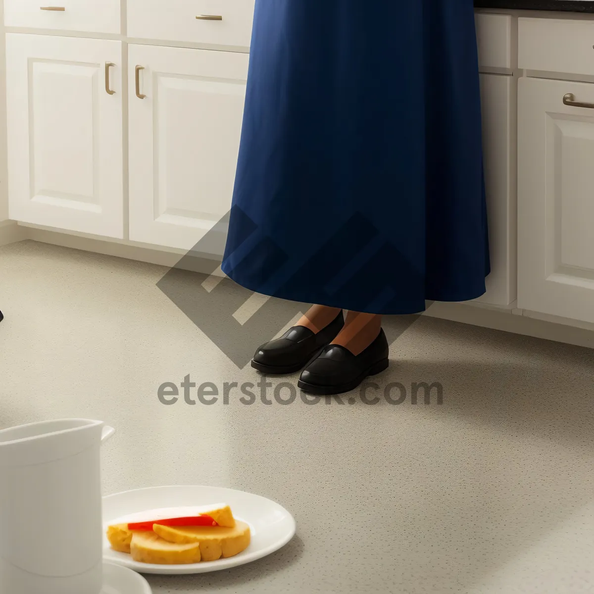 Picture of Modern kitchen interior with white appliances and refrigerator