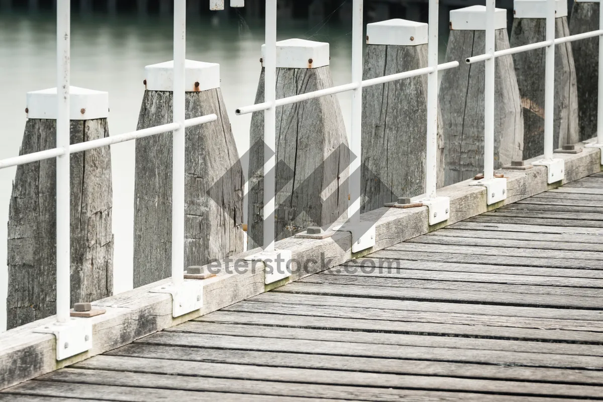 Picture of Old city house and picket fence by water