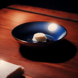 Bowl with cup and mouse device icon