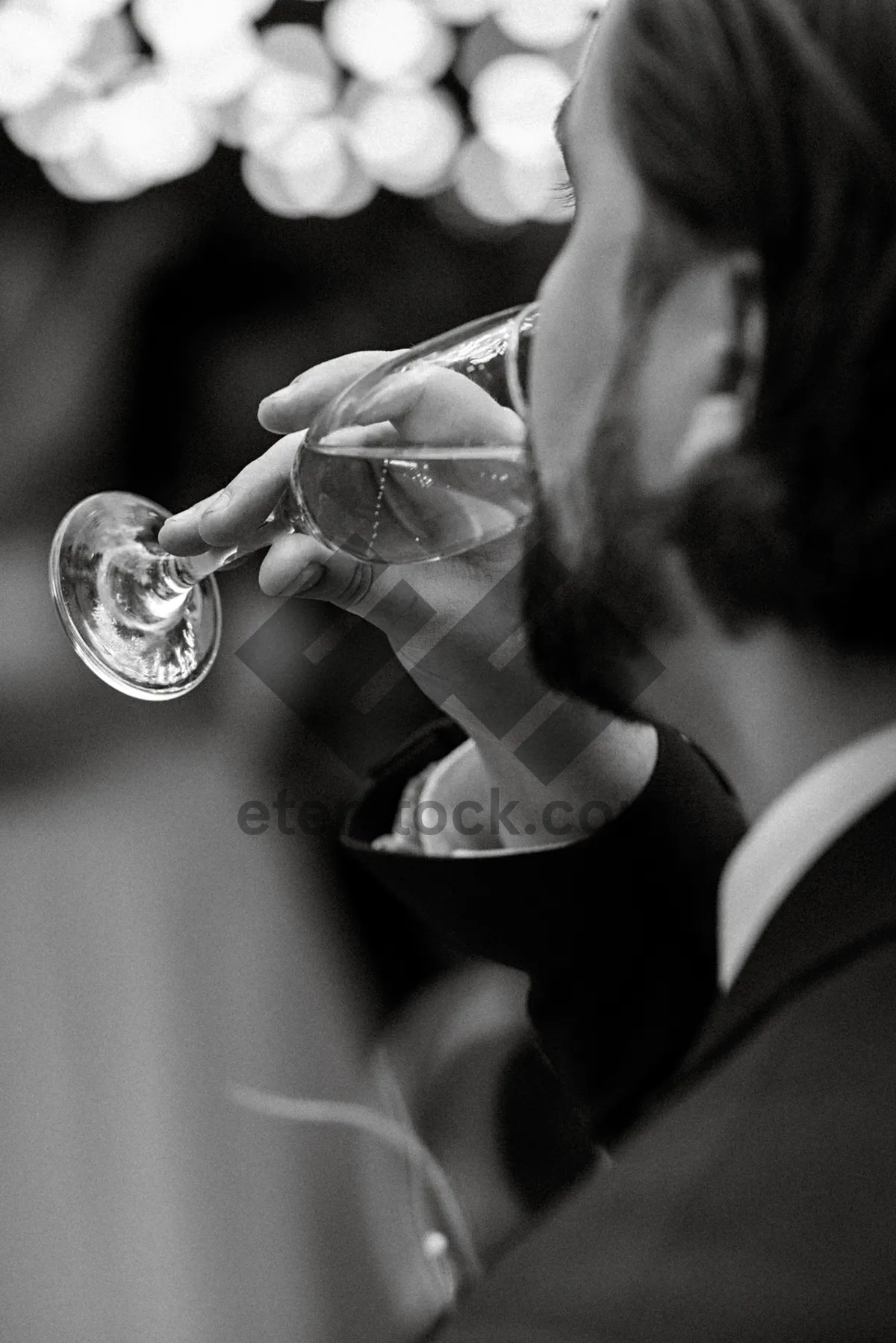 Picture of Sexy black male model with brass cornet and wine