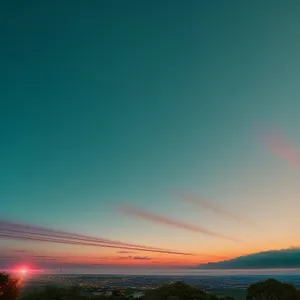 Golden Horizon Over Ocean: Stunning Sunset by the Sea