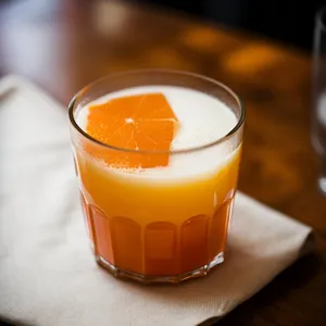 Refreshing Orange Creamsicle Cocktail - Cold Drink on Table