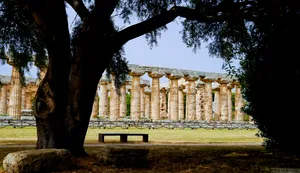 Autumn cemetery landscape with ancient temple