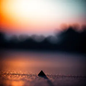 Dazzling Celestial Sunset over Serene Landscape