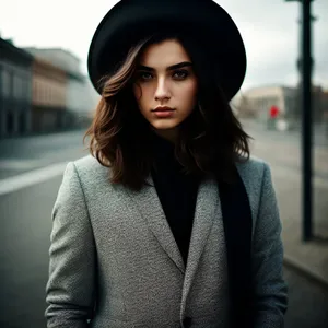 Smiling brunette businesswoman in leather jacket