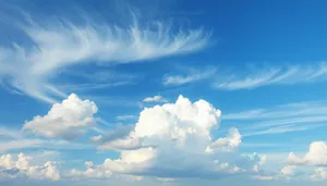 Bright Sunny Cloudscape in Fluffy, Clear Azure Sky.