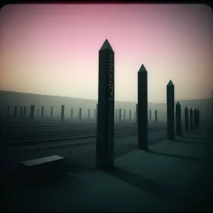 Sunset Skyline over Urban Obelisk