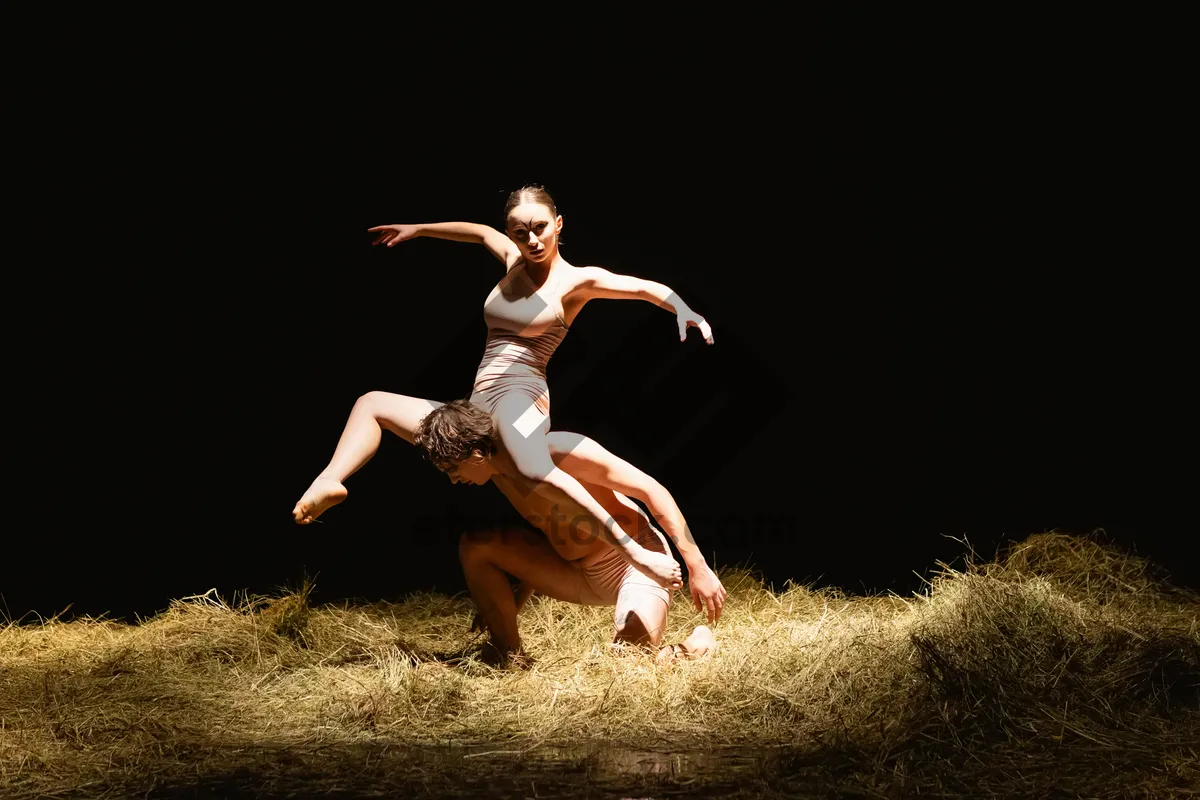 Picture of Happy adult dancing under clear blue sky in summer