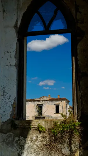 Ancient Castle Ruins Under Blue Sky