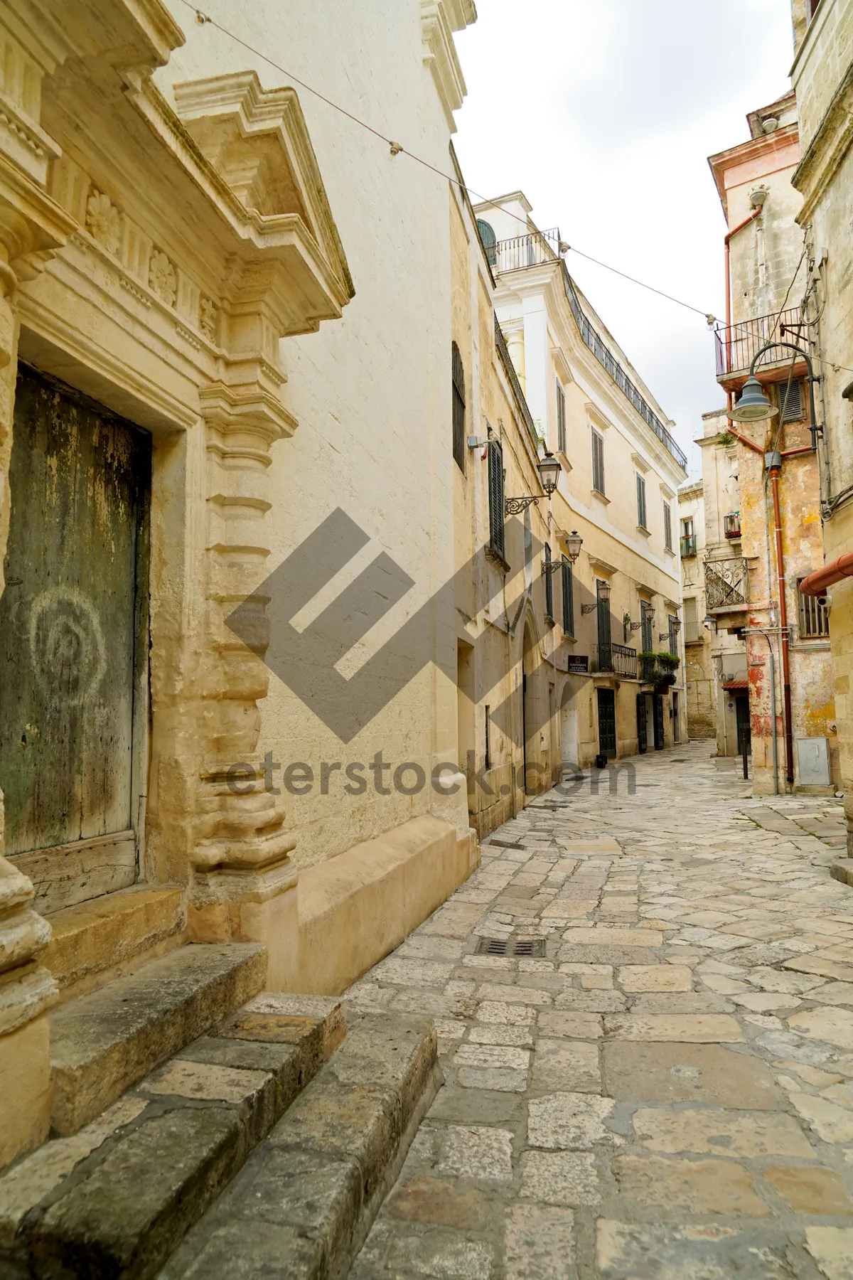 Picture of Historic church in old city with stone arch doorway.