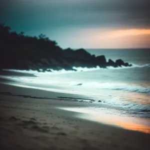 Serene Sunset over Sandy Beach