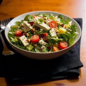 Healthy salad with fresh vegetables and cheese.