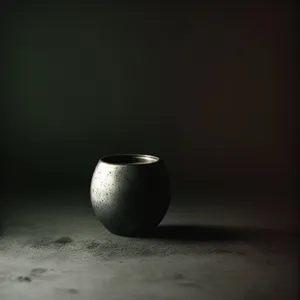 Black Egg Cup in Stone Vessel with Acorn