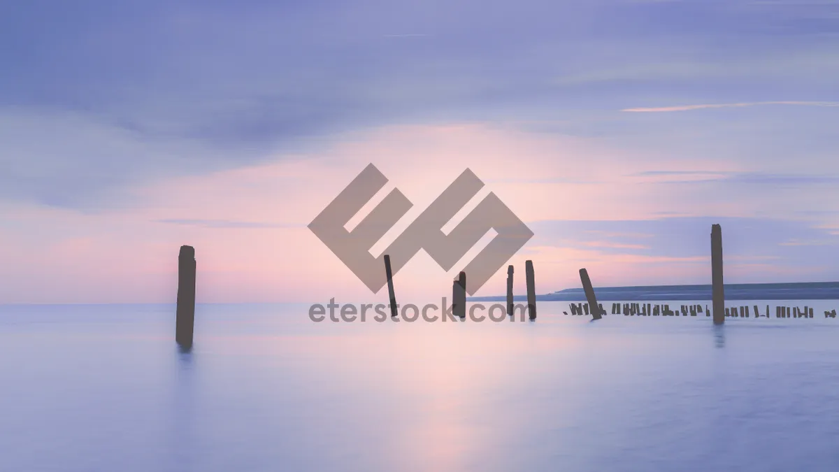 Picture of Silhouette skyline at sunset over the ocean