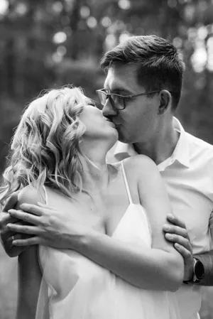 Attractive couple smiling in the park.