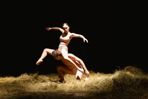 Happy adult dancing under clear blue sky in summer