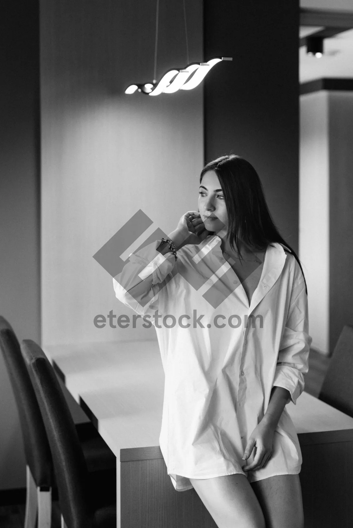 Picture of Friendly businessman smiling during a phone conversation.