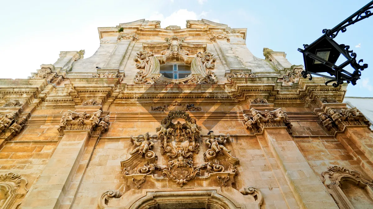 Picture of Historic Cathedral and Statue in Ancient Cityscape