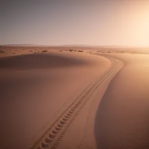 Serenity by the Sandy Shores: A Captivating Beachscape at Sunset