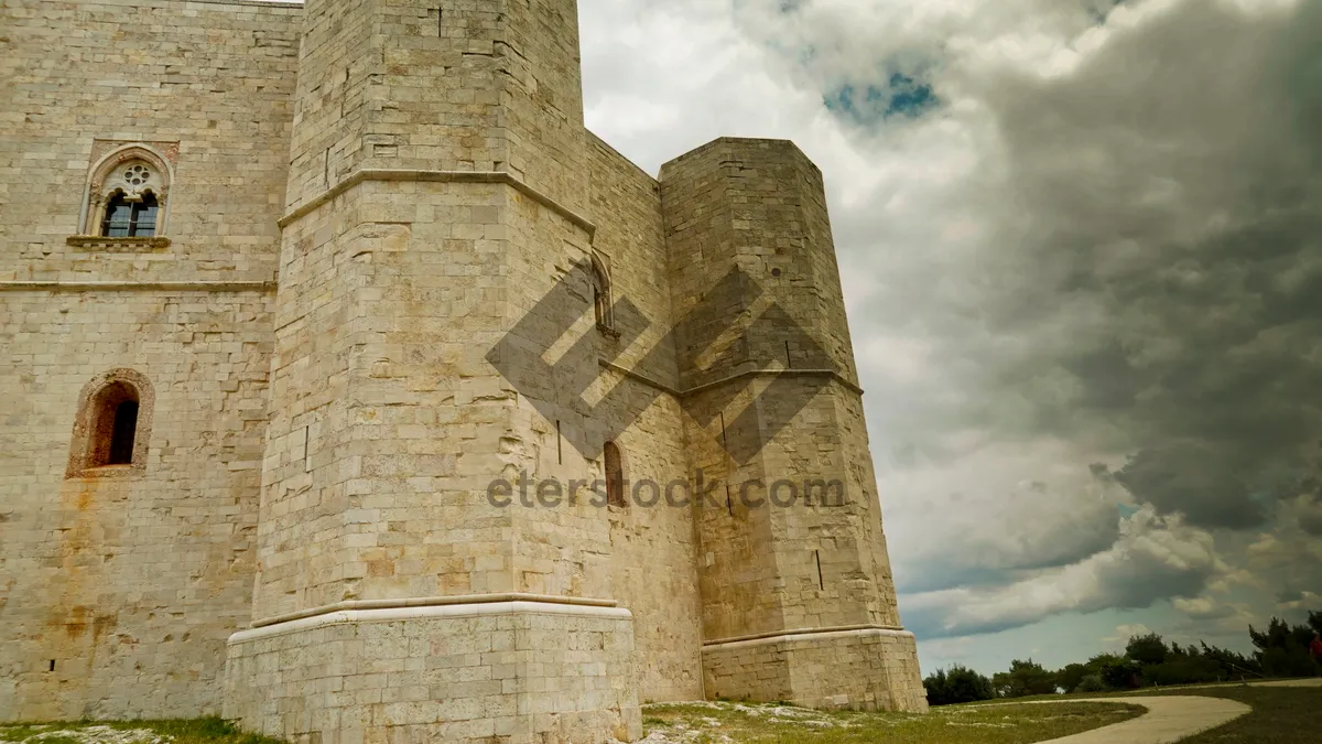 Picture of Ancient Castle Tower Against Sky.