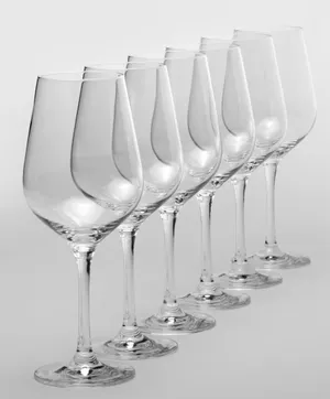 Luxury Wine Celebration at Restaurant Table with Glassware