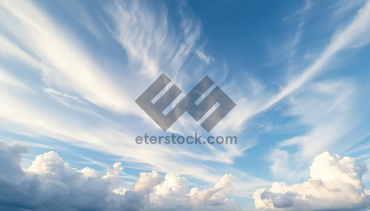 Picture of Bright Sunny Sky Landscape with Fluffy Clouds