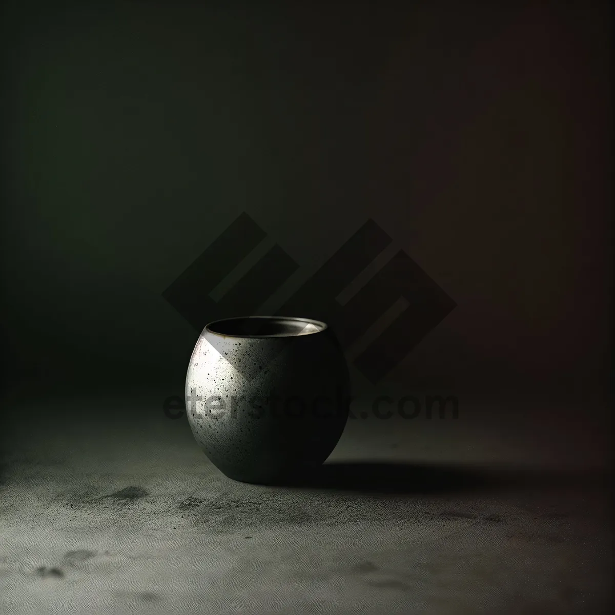 Picture of Black Egg Cup in Stone Vessel with Acorn