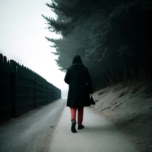 Urban Rainwalker - Stylish Man in Trench Coat on City Sidewalk