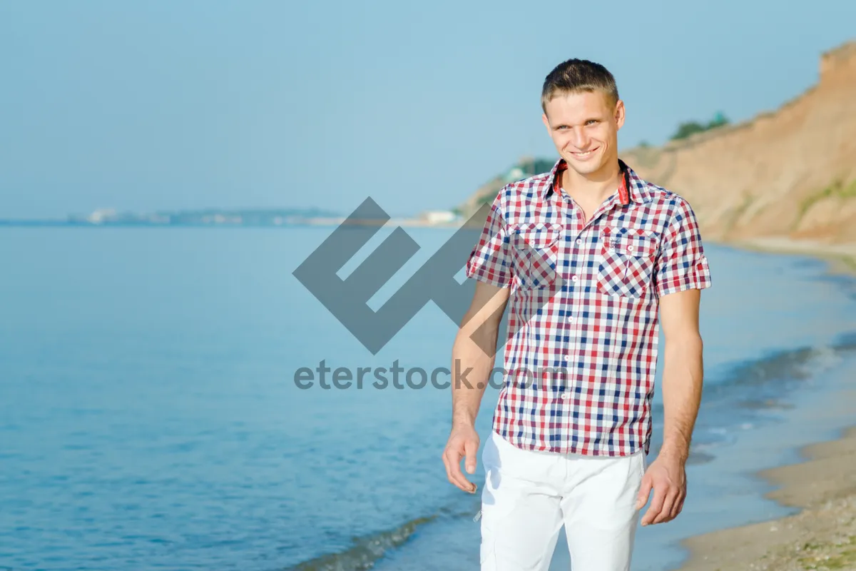 Picture of Happy couple enjoying summer vacation on the beach.