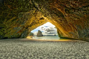 Mountain Tent by the Shore at Sunset