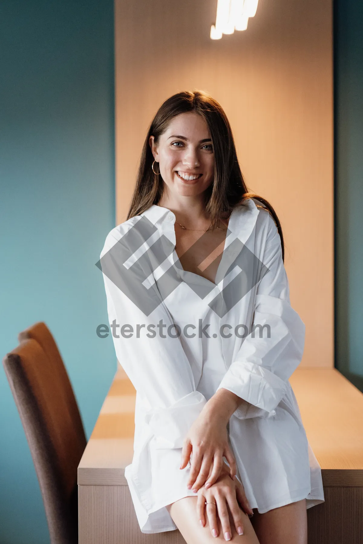 Picture of Smiling Businesswoman in Professional Attire at Office