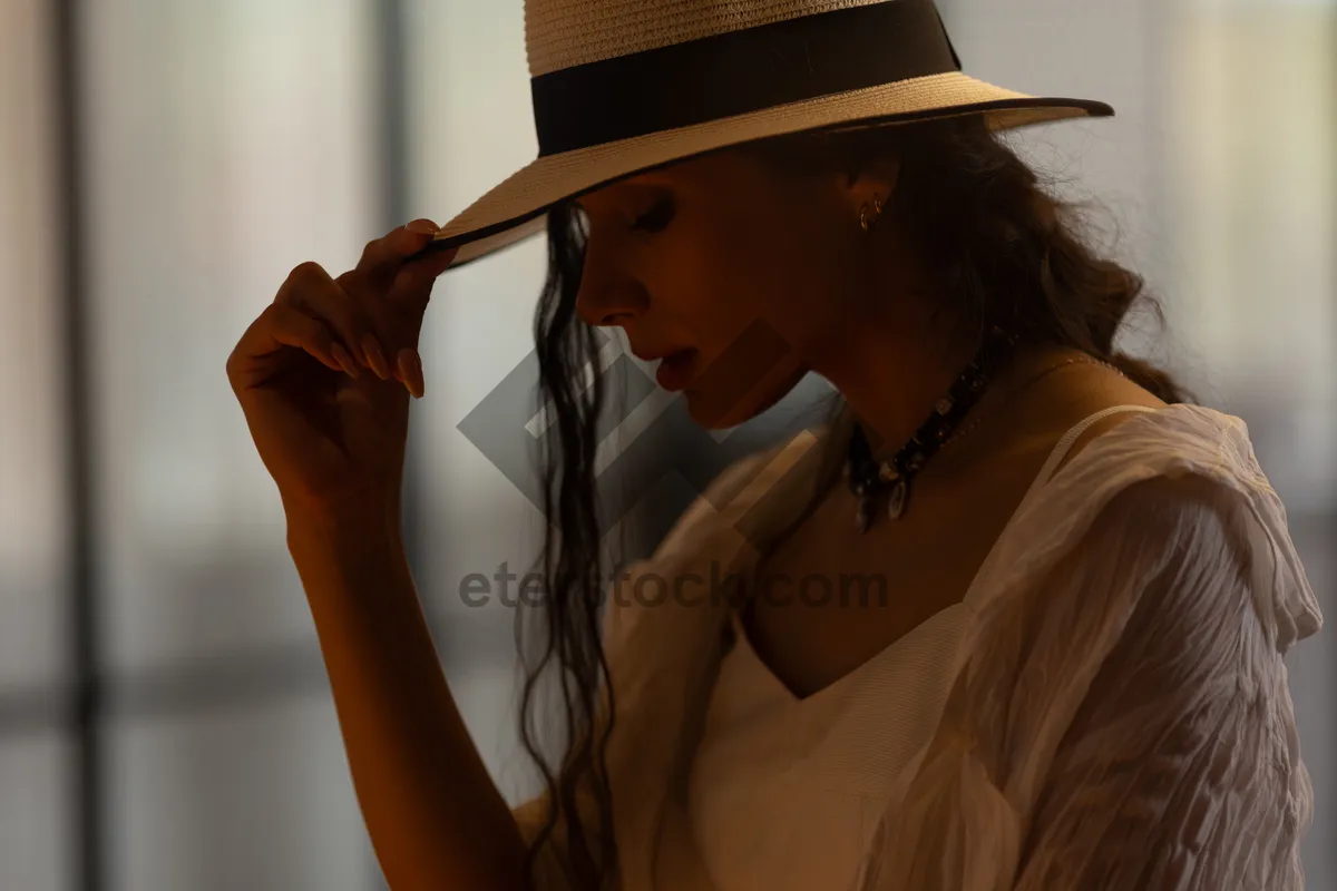 Picture of Smiling fashion model with hat