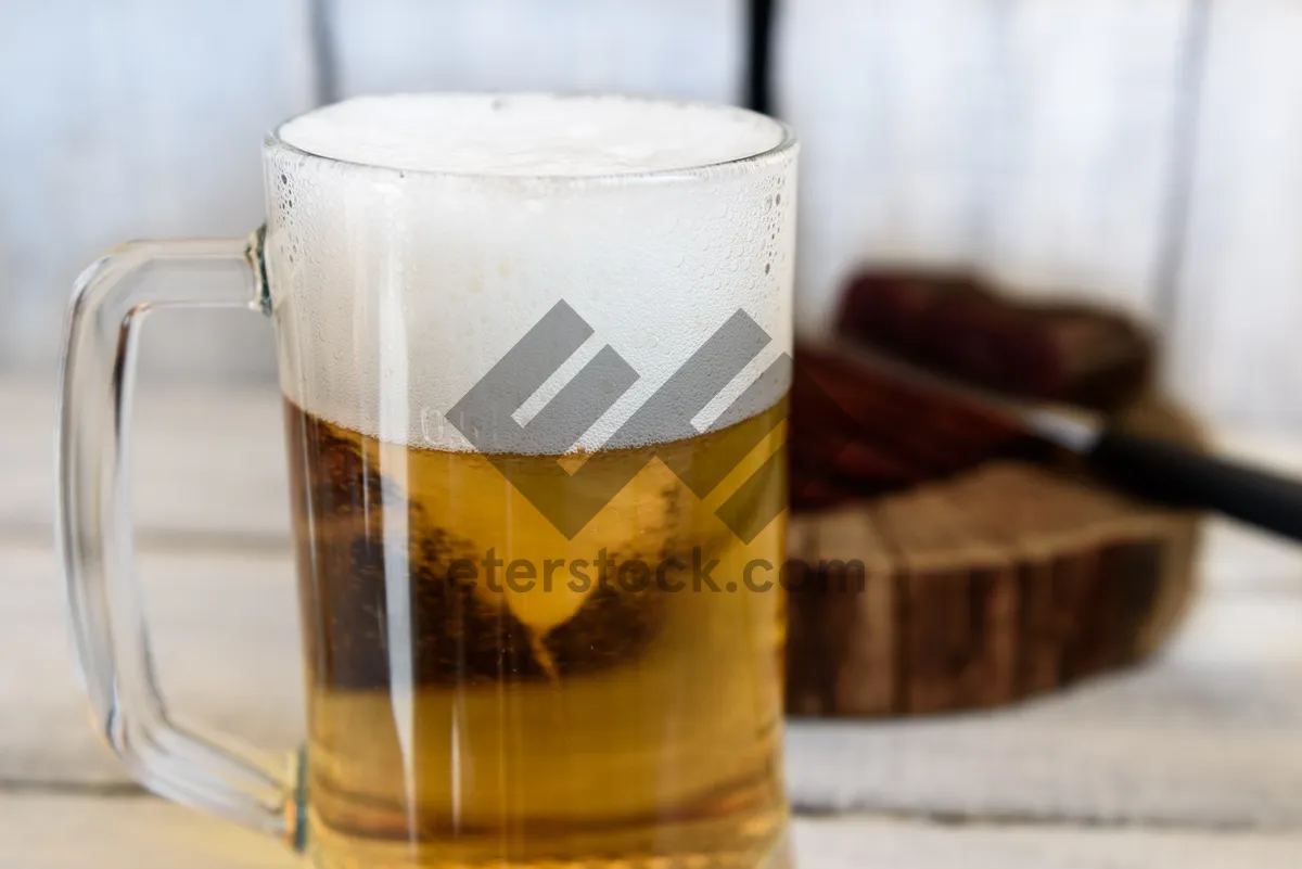 Picture of Refreshing cold beer in amber pint glass