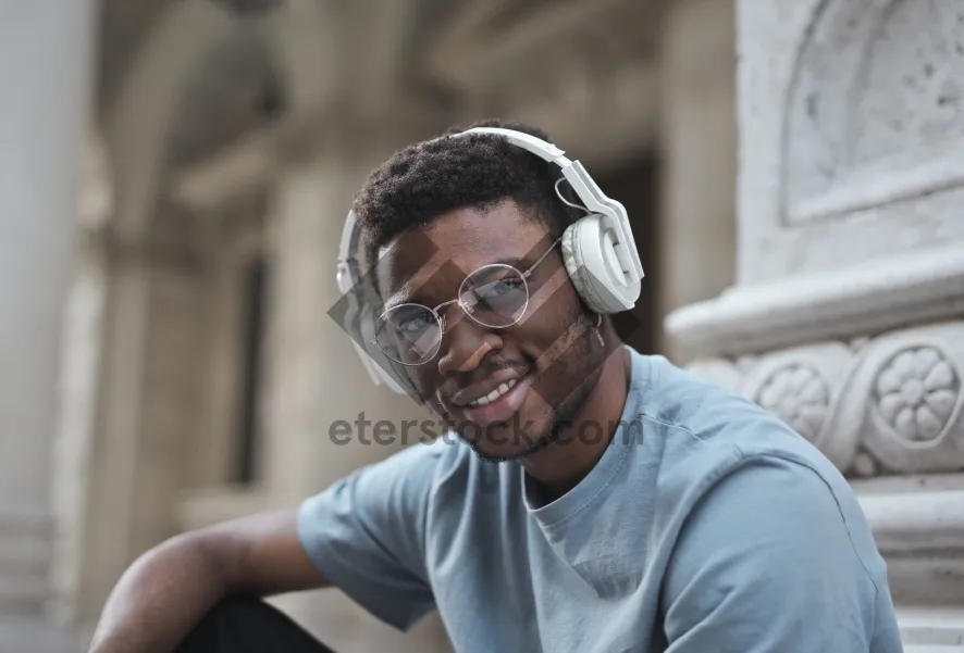 Picture of Happy senior man outdoors smiling with goggles sunglasses.