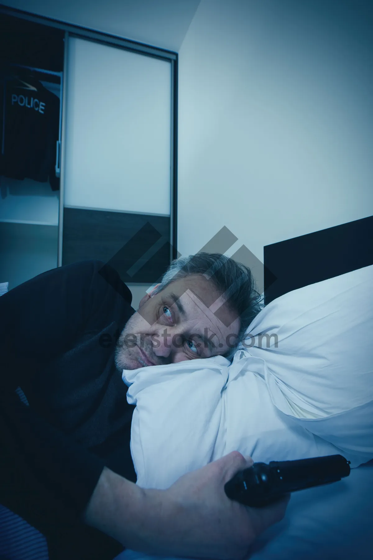 Picture of Happy couple cuddling in hospital bed