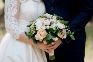 Romantic floral wedding bouquet with pink roses