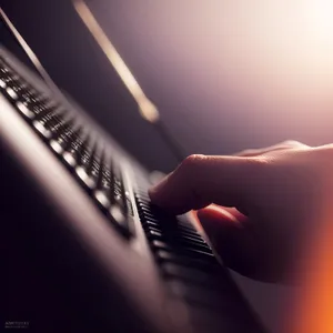 Tech Office: Hand on Keyboard - Close-Up Business Device