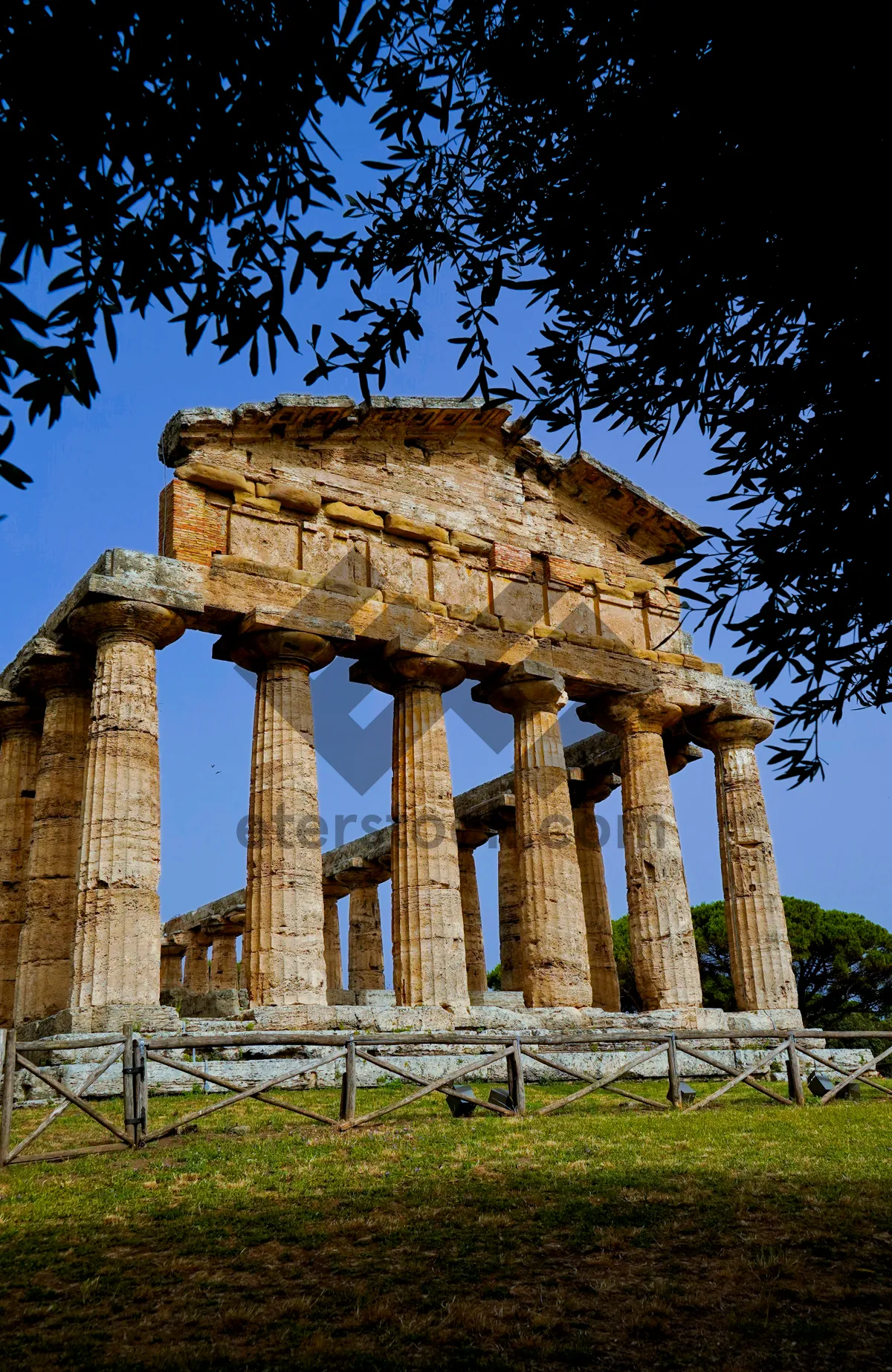 Picture of Ancient Temple Statue Against Blue Sky