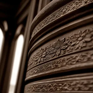 Columned Arabesque: Ancient Carvings of Historic Architecture