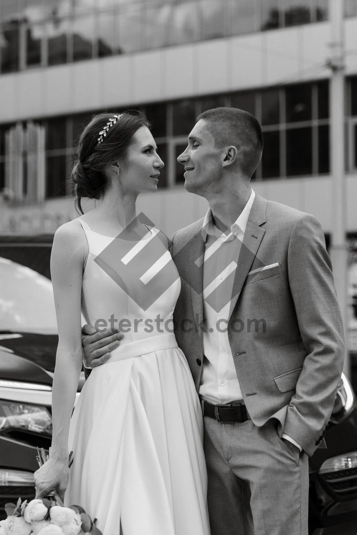 Picture of Happy wedding couple in love and smiling together outdoors