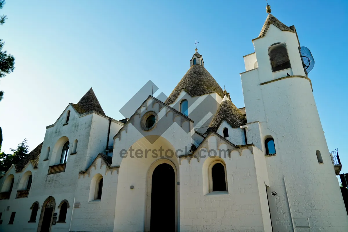 Picture of Historic church with bell tower and cross