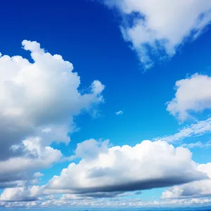 Fluffy Cumulus Overcast Floating in Azure Skies