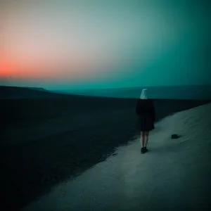 Ocean Sunset Silhouette over Beach