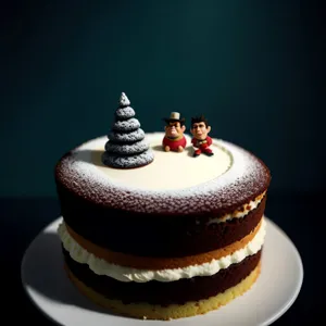 Delicious birthday cake with chocolate icing and fruit